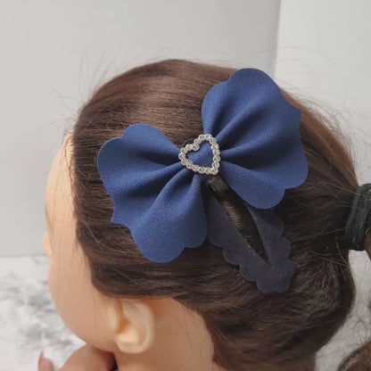 Navy velvet snap clip bow